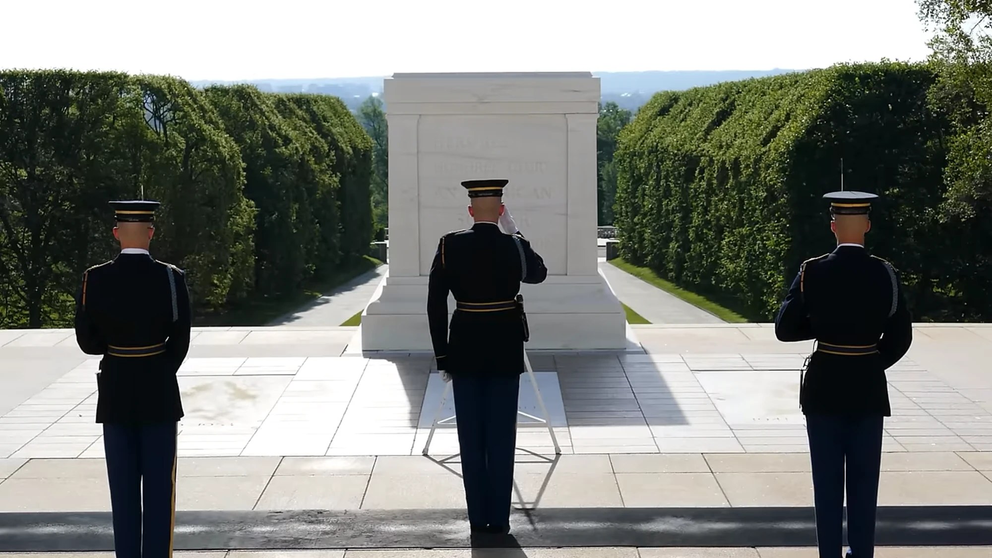 Tomb Guards saluting at the Tomb of the Unknown Soldier, Arlington National Cemetery